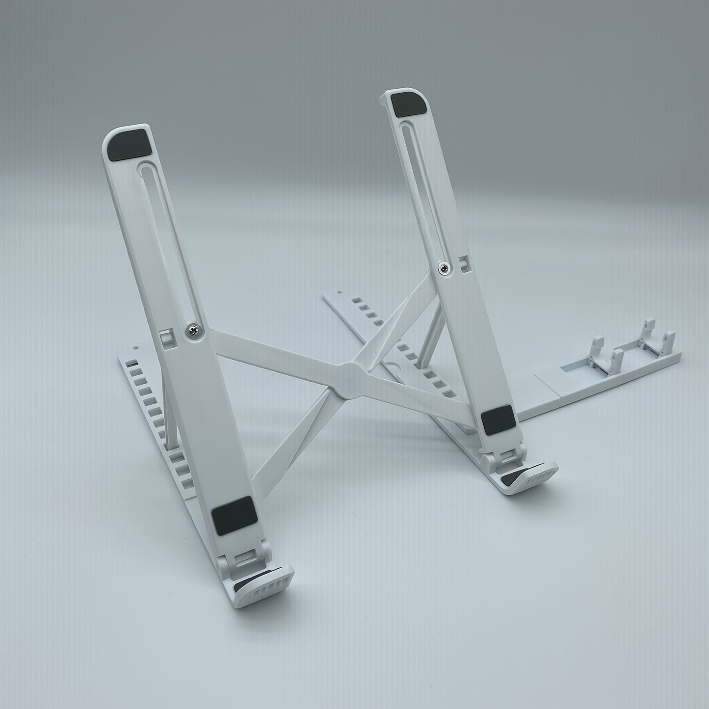 2-in-1 adjustable laptop stand with cooling function, portable ABS tripod base, stable and ergonomically designed, suitable for home office and remote work, laptop support stand, essential item for remote work, modern technol