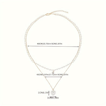 Elegant Golden-Tone Double Heart Necklace for Women – Chic Layered Design with Faux Pearl Accents, Versatile Clavicle Chain for Casual Attire or Parties, Perfect Gift Idea, Charm Necklace