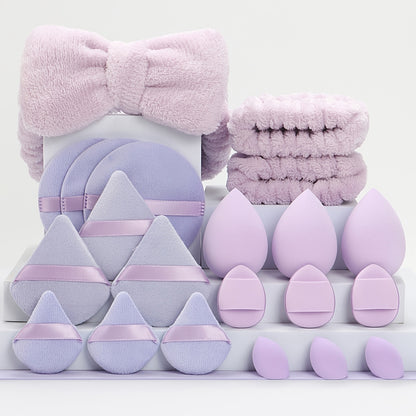 A Set of 21 Hair Accessories, Including 1 Butterfly Headband, 2 Wristbands, 6 Powder Puffs, 3 Makeup Sponges, 3 Finger Cushions, 3 Makeup Remover Pads, And 3 Mini Beauty Sponges.